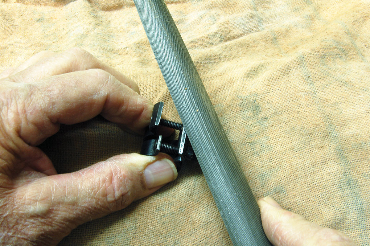 The contact surfaces of the stamped dovetail scope bases must sometimes be sharpened to clamp uniformly to the dovetail.